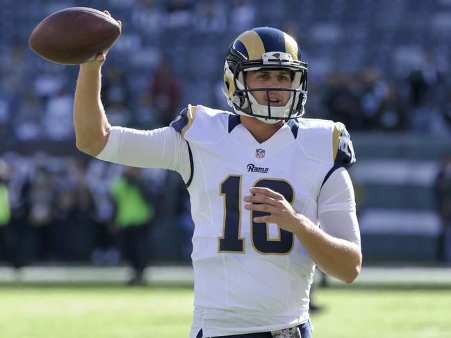 FILE - In this Nov. 13, 2016, file photo, Los Angeles Rams quarterback Jared Goff (16) warms up before an NFL football game against the New York Jets, in East Rutherford, N.J. A person with knowledge of the decision tells The Associated Press that quarterback Jared Goff will make his NFL debut on Sunday when the No. 1 pick starts for the Los Angeles Rams. The source spoke on condition of anonymity Tuesday, Nov. 15, 2016, because Rams coach Jeff Fisher hadn't made the official announcement. (AP Photo/Bill Kostroun, File)