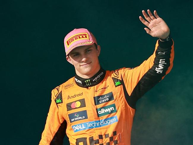 MIAMI, FLORIDA - MAY 04: Race winner Oscar Piastri of Australia and McLaren on the podium during the F1 Grand Prix of Miami at Miami International Autodrome on May 04, 2025 in Miami, Florida.   Hector Vivas/Getty Images/AFP (Photo by Hector Vivas / GETTY IMAGES NORTH AMERICA / Getty Images via AFP)