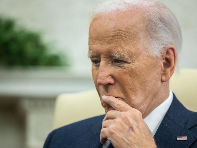 (FILES) US President Joe Biden holds a bilateral meeting with Cypriot President Nikos Christodoulides (out of frame) in the Oval Office of the White House in Washington, DC, on October 30, 2024. Joe Biden hoped Kamala Harris would salvage his legacy as the man who saved America from Donald Trump. Instead, it lies in tatters. Had Harris won, the rows over his age and refusal to bow out earlier would have been forgiven by the Democratic Party. Biden would have been able to celebrate a list of achievements in his one term that included guiding the country out of the Covid crisis, passing historic legislation, building infrastructure and promoting green energy. (Photo by Tierney CROSS / AFP)