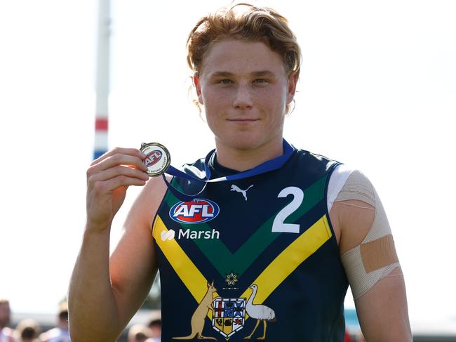 MELBOURNE, AUSTRALIA - APRIL 27: Levi Ashcroft of the AFL Academy poses with his best on ground medal during the 2024 AFL Academy match between the Marsh AFL National Academy Boys and Footscray Bulldogs at Whitten Oval on April 27, 2024 in Melbourne, Australia. (Photo by Michael Willson/AFL Photos via Getty Images)