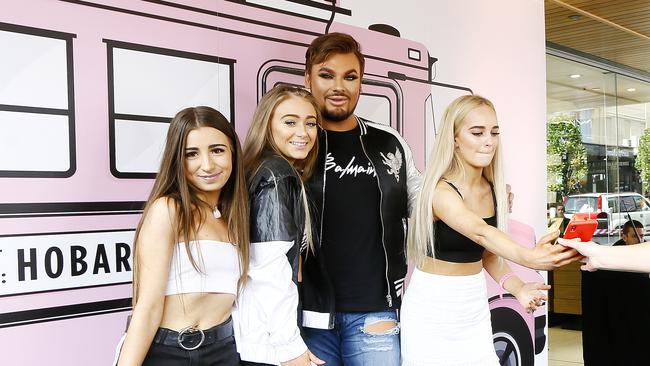 YouTube makeup guru Michael Finch with (L-R) Kat Brock, 16, Ebony Piuselli, 15, and Lucy Marley, 15. Picture: MATT THOMPSON