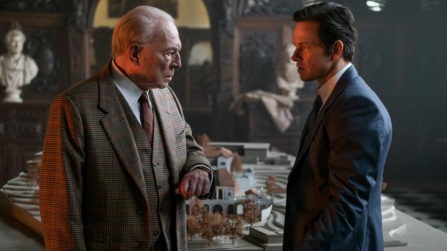 Christopher Plummer as J. Paul Getty and Mark Wahlberg as Fletcher Chase in a scene from film All the Money in the World.