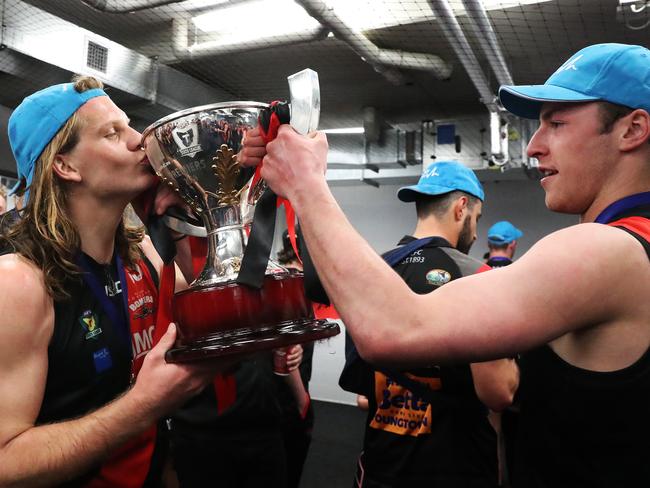 Liam Davies and current co-captain Fletcher Bennett with the 2019 premiership cup. Picture: NIKKI DAVIS-JONES