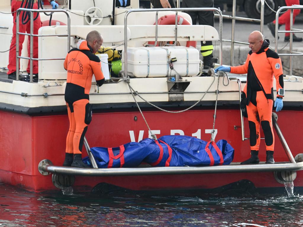 Divers recovered bodies from the doomed superyacht which sunk off the coast of Sicily in a storm. Picture: Alberto PIZZOLI / AFP.