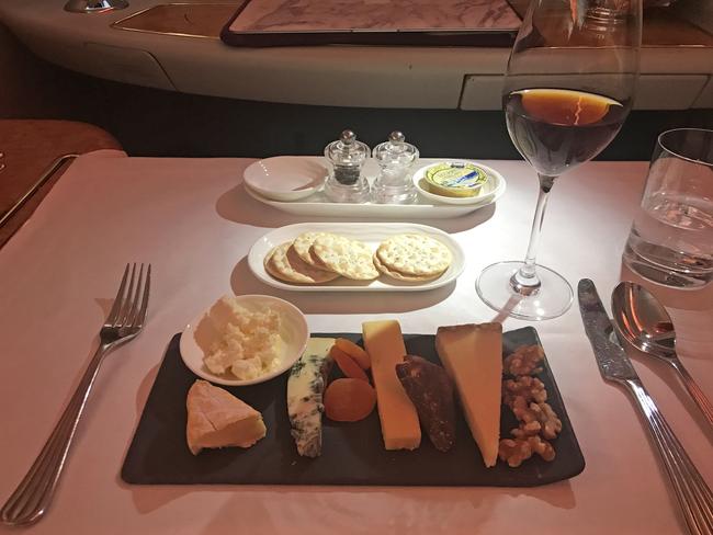 The cheese platter and exclusive port served in First Class. Picture: Celeste Mitchell