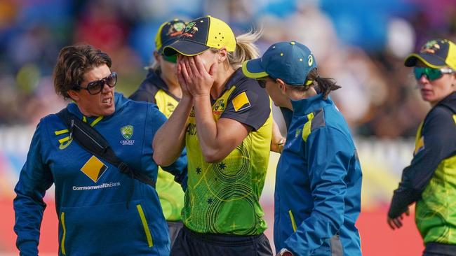 Ellyse Perry of Australia reacts as she leaves the field injured during the Women's T20 World Cup cricket match between Australia and New Zealand. Picture: AAP