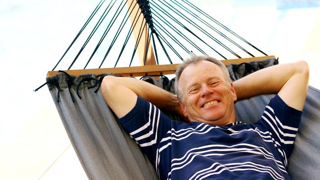 Cricket umpire Bruce Oxenford relaxing on the Gold Coast.