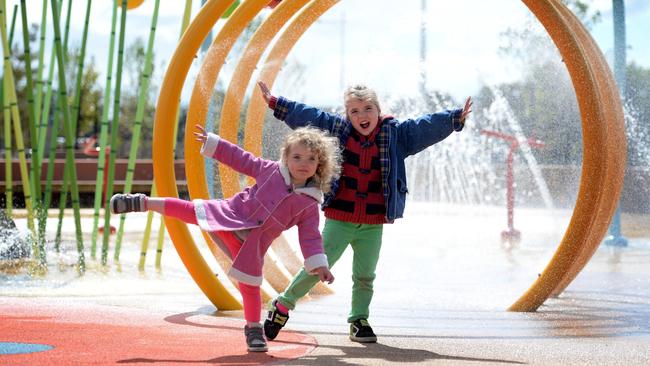 Poppy, 2, and Matilda, 4, at Village Park.