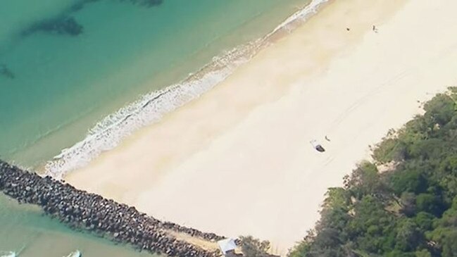 Police were conducting a search off Main Beach Groyne, near where the man was found. Picture: ABC