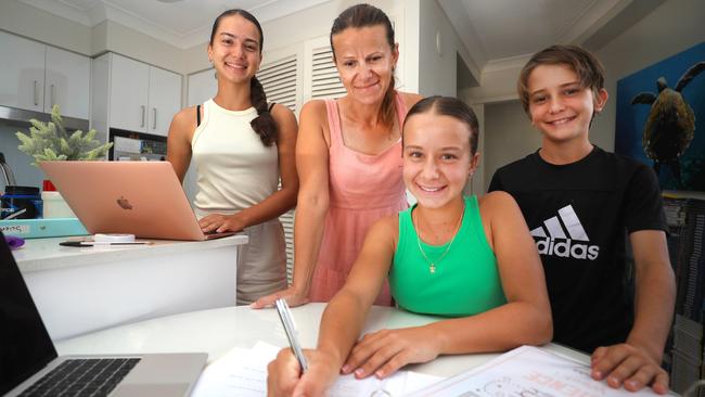 Gold Coast mother Vesna Kacar (middle left) will continue to homeschool her three children this year – Mia (far left), Emma (middle right) and Luka (far right). Photo: Scott Powick.