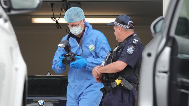 Police at the murder scene in Cox Street, Pimpama where notorious bikie Shane Bowden was gunned down in his driveway. Picture Glenn Hampson.