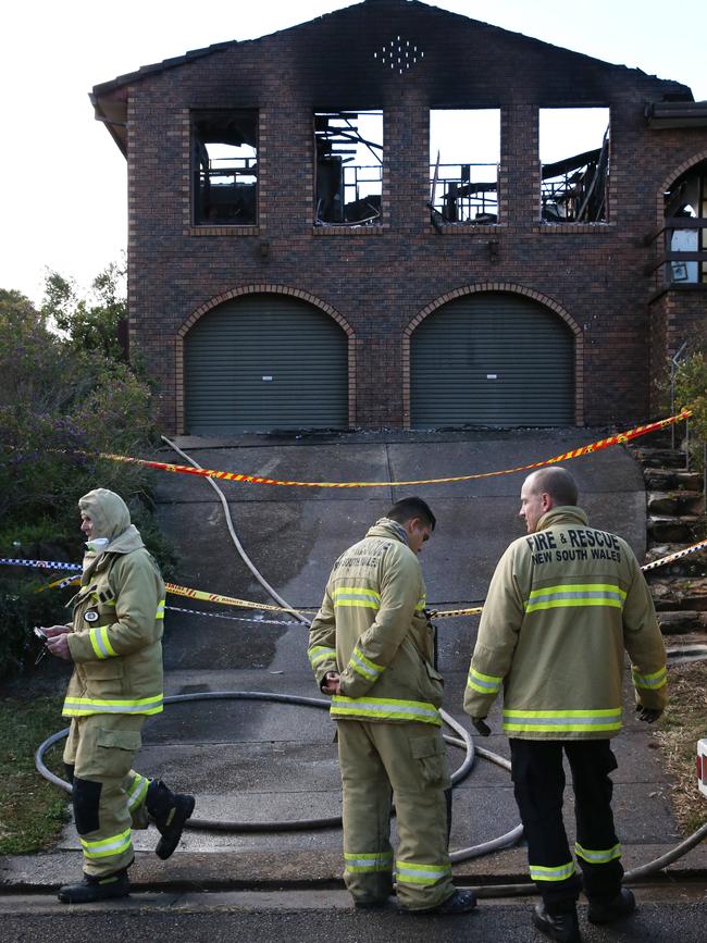 The charred remains of the house. Picture: David Swift