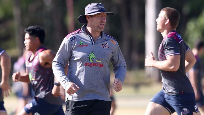 Coach Brad Thorn runs the rule over Reds training on Monday. Picture: Getty