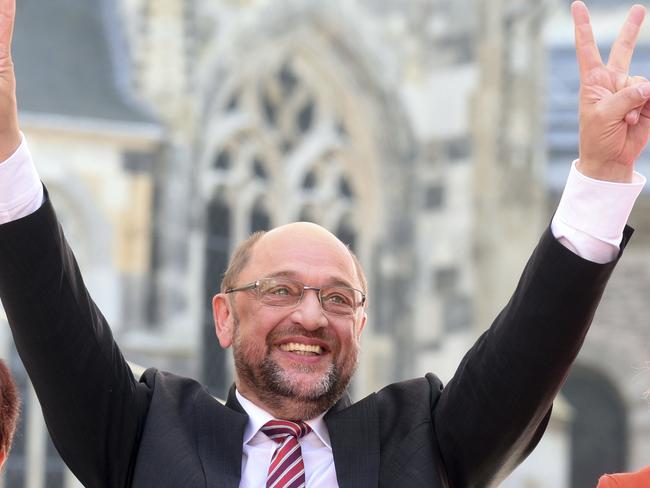 Social Democratic Party chairman and top candidate Martin Schulz flashes victory signs at an election campaign event in Aachen, Germany. Picture: AP