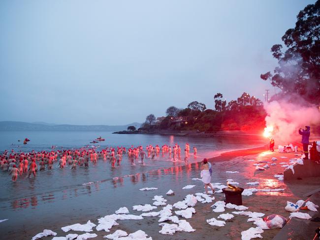 The nude solstice swim at Sandy Bay. Picture: COURTESY MONA