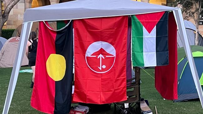 The flag of the Popular Front for the Liberation of Palestine, centre, was seen flying at the University of Queensland in Brisbane this week.