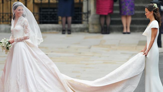 Kate Middleton and her sister Pippa, in Sarah Burton for Alexander McQueen. Picture: pascal Le Segretain/Getty Images.