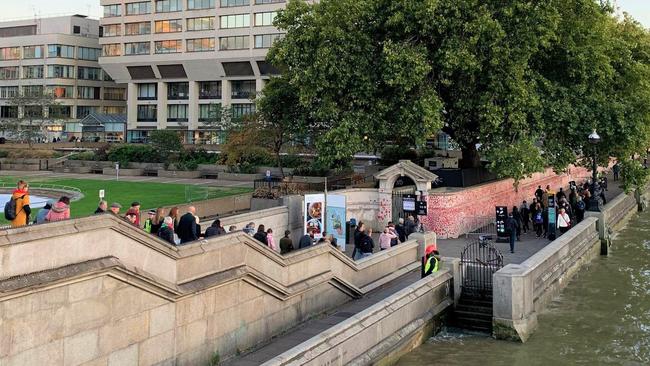 Crowds walk along the Thames in London to pay last respects to the Queen. Picture: Natalie Bosnic