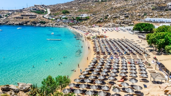 Mykonos' Paradise Beach is not just beautiful, it's ideal for travellers on a budget.