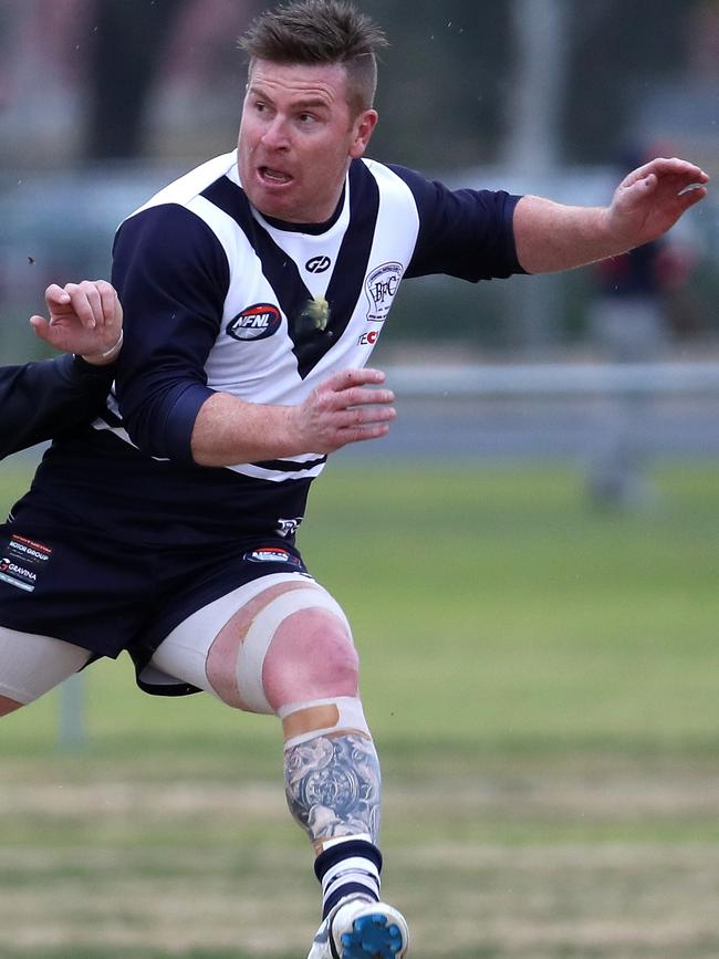 Gary Moorcroft in action for Bundoora.