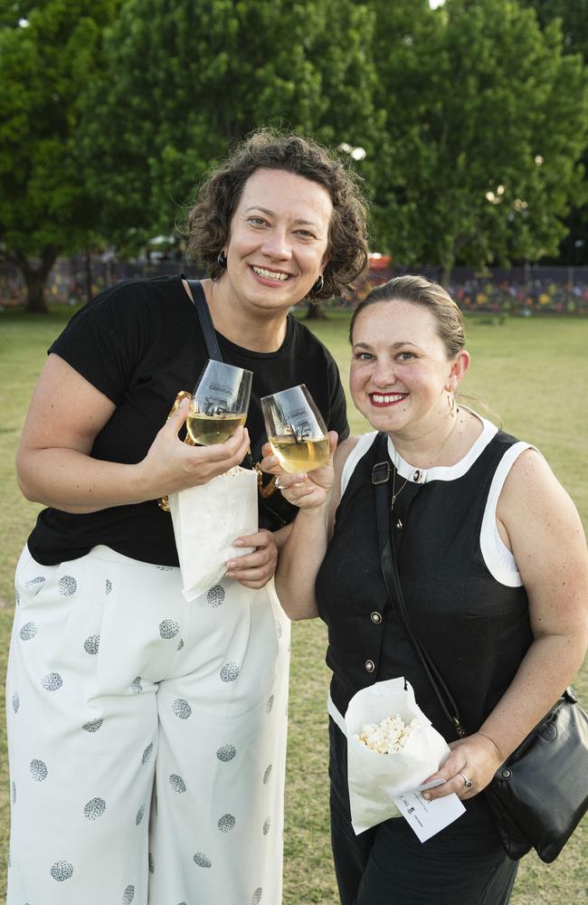 Maida Kopic (left) and Beth Bickford at Symphony Under the Stars concert performed by the Queensland Symphony Orchestra in Queens Park Amphitheatre for Carnival of Flowers, Friday, October 4, 2024. Picture: Kevin Farmer