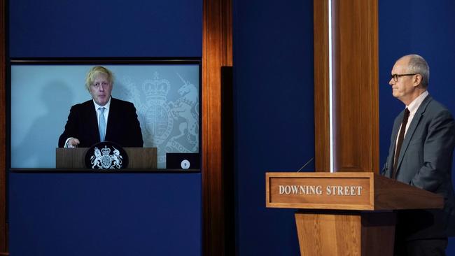 British Prime Minister Boris Johnson, with chief scientific adviser Sir Patrick Vallance this week, wants Britons to judge for themselves what precautions to take. Picture: Getty Images