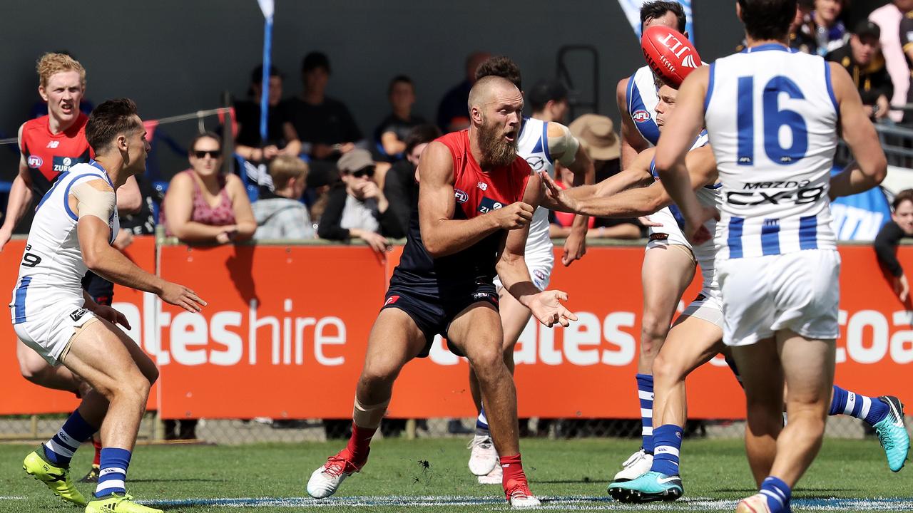 AFL: JLT Community Series, North Melbourne vs. Melbourne, Twin Ovals, Kingston Tasmania: Melbourne's Max Gawn feeds out a handball Picture: LUKE BOWDEN