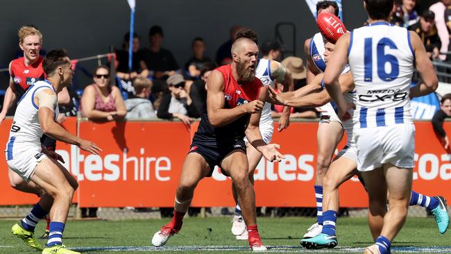 AFL: JLT Community Series, North Melbourne vs. Melbourne, Twin Ovals, Kingston Tasmania: Melbourne's Max Gawn feeds out a handball Picture: LUKE BOWDEN