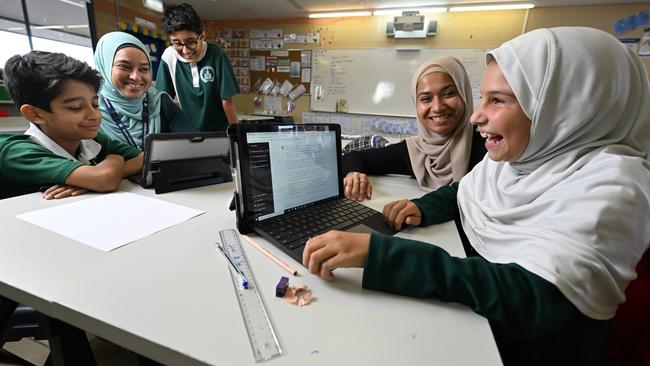 Islamic College of Brisbane Year 6 students and staff exploring how ChatGPT works earlier this month, as they constructed stories. Picture: Lyndon Mechielsen