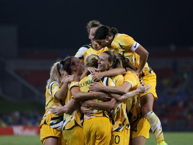 EMBARGO FOR TWAM 26 SEP 2020 FEE APPLIESNEWCASTLE, AUSTRALIA - MARCH 06: Clare Polkinghorne of the Australian Matildas celebrates her goal with team mates during the Women's Olympic Football Tournament Play-Off match between the Australian Matildas and Vietnam at McDonald Jones Stadium on March 06, 2020 in Newcastle, Australia. (Photo by Ashley Feder/Getty Images)