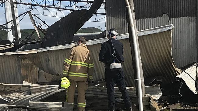 Fire investigators on scene at a burnt shed in Forest which causes $4 million damage to a local construction company. Picture: Helen Kempton.