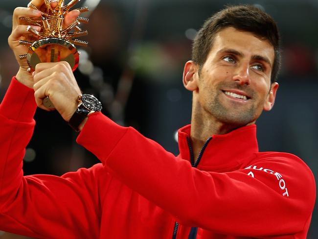 MADRID, SPAIN - MAY 08: Novak Djokovic of Serbia holds aloft his winners trophy after his three set victory against Andy Murray of Great Britain in the mens final during day nine of the Mutua Madrid Open tennis tournament at the Caja Magica on May 08, 2016 in Madrid,Spain. (Photo by Clive Brunskill/Getty Images) *** BESTPIX ***