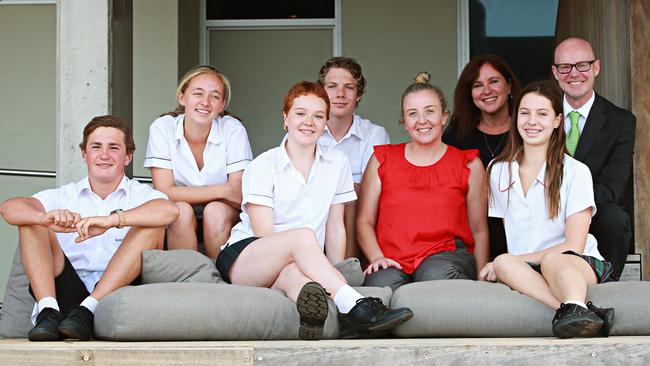 Barrenjoey High students, with support workers from Avalon Youth Hub and Justene Gordon and Principal Ian Bowsher at Avalon Beach. Picture: Adam Yip / Manly Daily