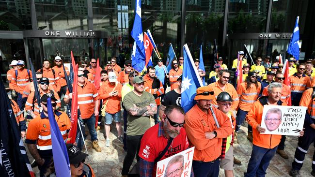 Members of the CFMEU protest outside the Queensland Government offices at 1 Williams Street in Brisbane on Thursday. Picture: NCA NewsWire / Dan Peled