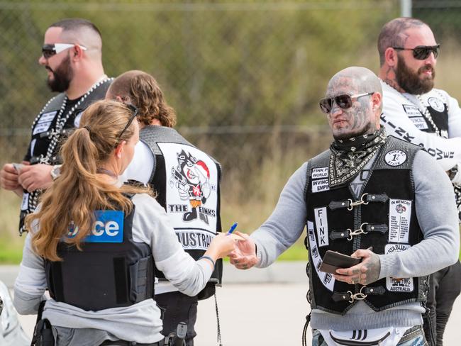 Finks outlaw motorcycle members meeting up at a service station south of Wodonga with police also in force. Picture: Simon Dallinger.