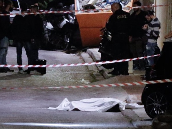 The body of John Macris who was gunned down in Athens, Greece. Picture: Proto Thema