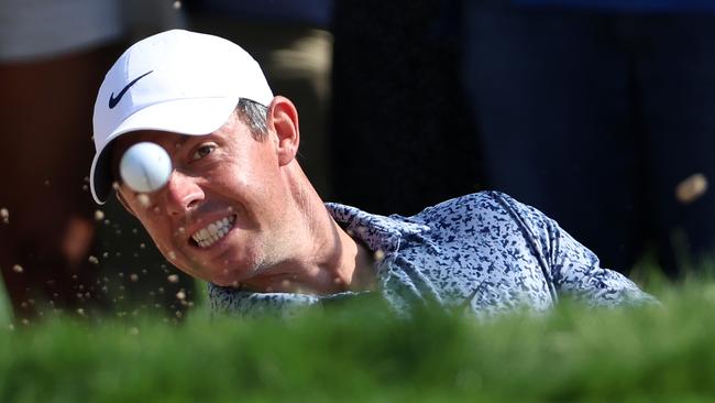 Rory McIlroy plays a bunker shot on his way to winning the Hero Dubai Desert