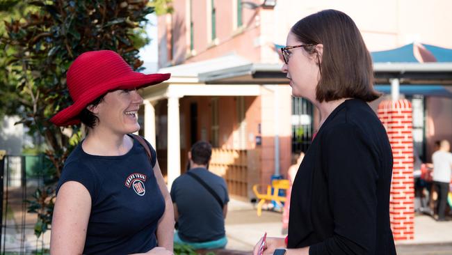 Voter Tessa Boyd-Caine talking with Balmain state Labor candidate Elly Howse at Forest Lodge Public School. Picture: Monique Harmer