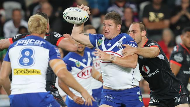 Greg Eastwood of the Bulldogs offloads the ball.