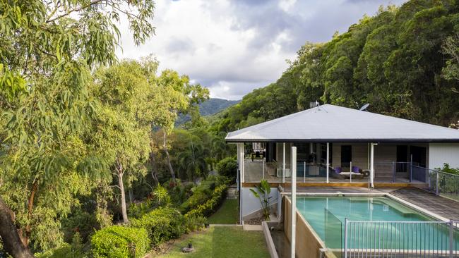 Ocean and mountain views and absolute privacy are on offer at the four bedroom, three bathroom residence at 300 Mowbray River Road, Mowbray. The house is set on an elevated 3.45ha block and has a 10m saltwater wet-edged pool. It is being marketed by Caroline Yarr of Queensland Sotheby’s International Realty. Picture: supplied.