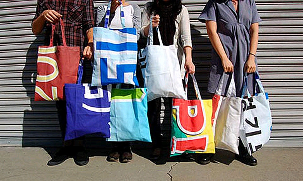 Made from redundant street banners, leather jackets and couches destined for the dump, creative group Poketo and South Korea’s eco-friendly non-profit shopEco Party have re-purposed these eco-friendly materials into an assortment of durable, one-of-a-kind tote bags. . Picture: Lost at E Minor