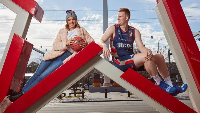 Olivia Rogers and Harry Froling at the Entertainment Centre where the Adelaide 36ers are playing their home games this season. Picture: Matt Loxton.