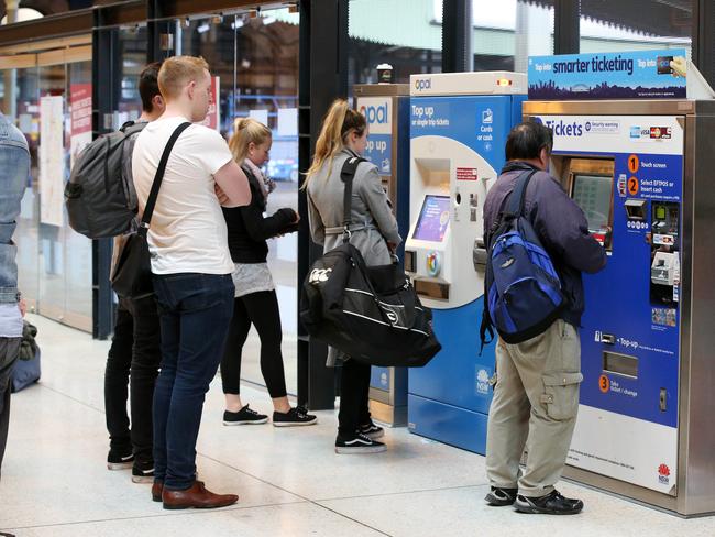 People at Central Station on the last day that paper tickets will be sold or accepted / Picture: Stephen Cooper