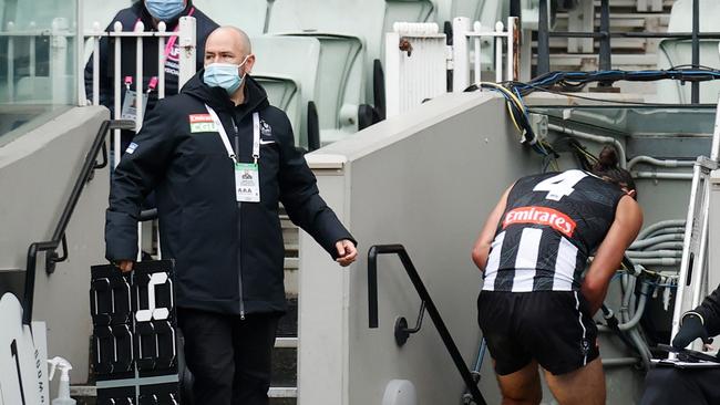 Grundy was subbed off in the third term and taken to hospital. Picture: AFL Photos