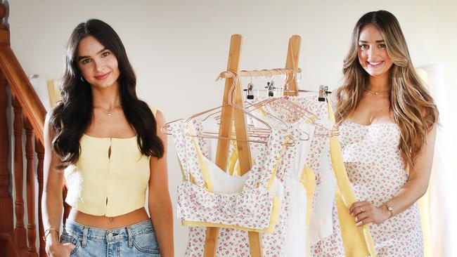 Gold Coast based brand Zarfie, is set to launch their newest collection on April 26th at 10am AEST, exclusively via their online store. Co-owners, sisters and designers Juliet Trotta and Maria Trotta with some of their designs. Picture Glenn Hampson