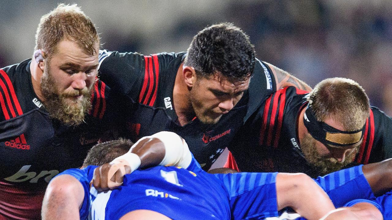 Owen Franks, Codie Taylor and Joe Moody of the Crusaders pack down.