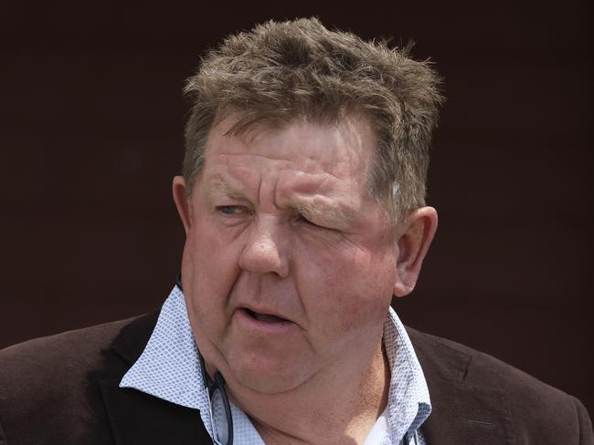 NEWCASTLE, AUSTRALIA - NOVEMBER 13: Trainer Brett Cavanough looks on during Sydney Racing at Newcastle Racecourse on November 13, 2021 in Newcastle, Australia. (Photo by Mark Evans/Getty Images)