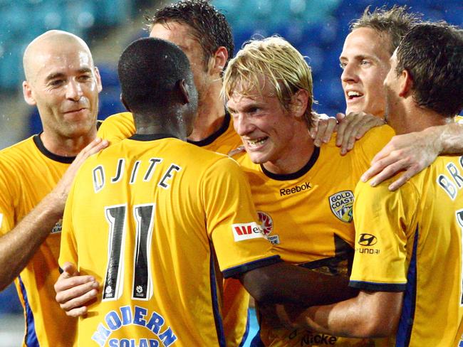 A League soccer match between Gold Coast United and Wellington Phoenix, held at Skilled Park, Robina, Gold Coast. United congratulates Sebastiaan Van Den Brink (centre) on his goal.