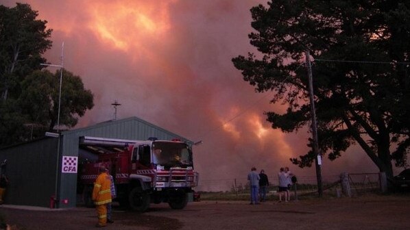 Locals watch the Kilmore East Fire from the Kinglake West Fire Station on Black Saturday, February 7, 2009. Picture: Supplied