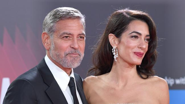 George Clooney and wife Amal flew into Sydney on Friday night with their twins.